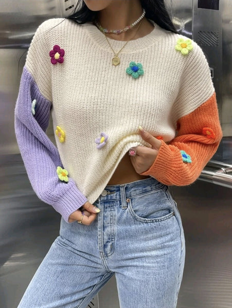 Suéter de lana blanco y flores